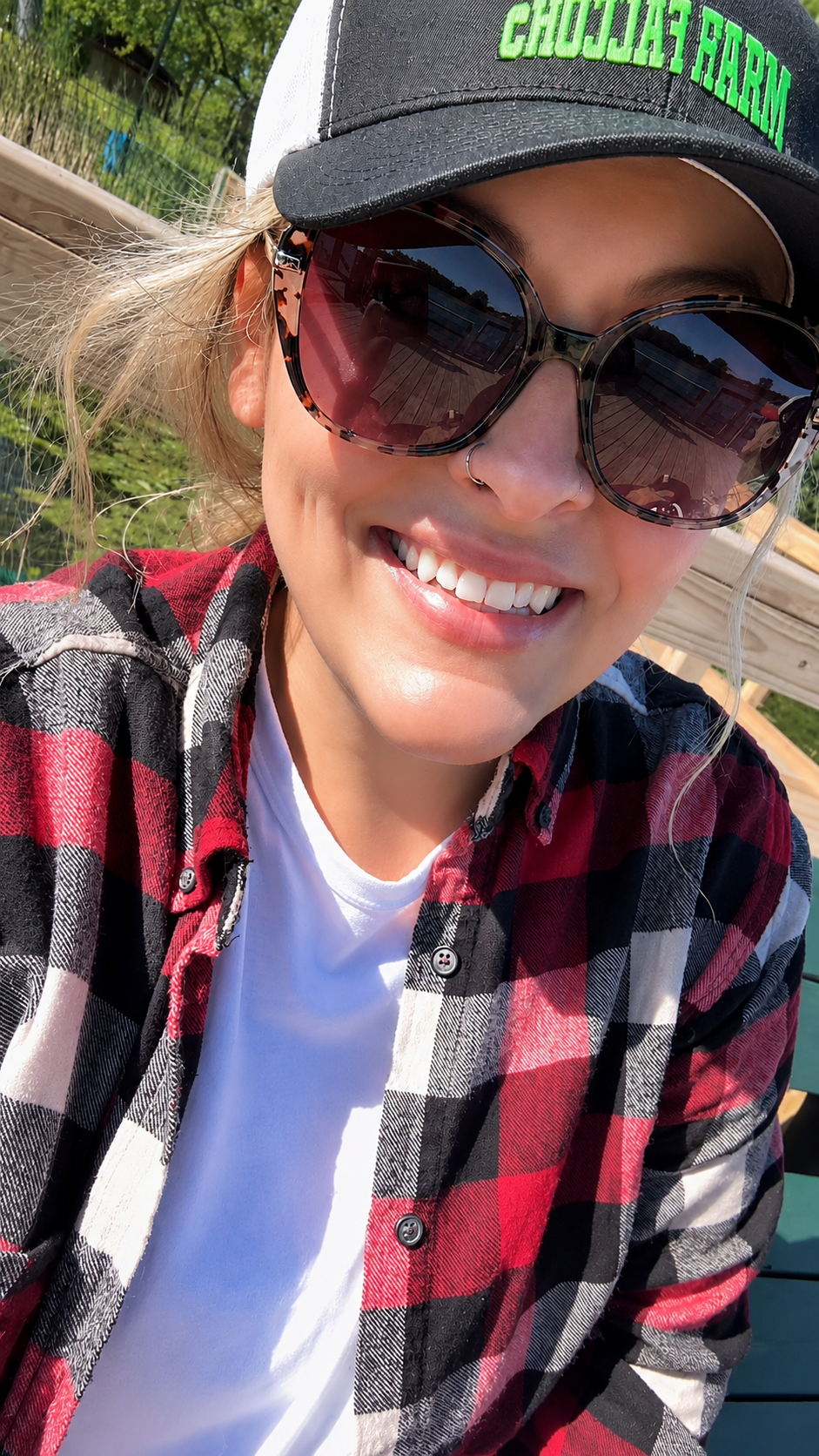 Erin Rose smiling outdoors